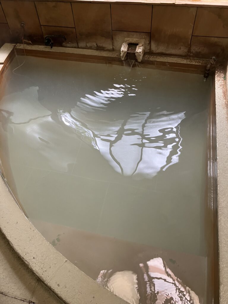 Almost transparent water in a hot spring bath